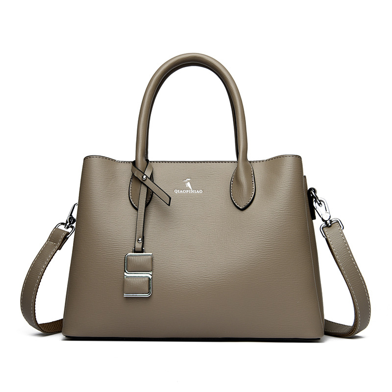 Nuevo bolso de mujer simple de moda, bolso de mano de cuero suave de gran capacidad, bolso de tela de mujer, bolso de canguro