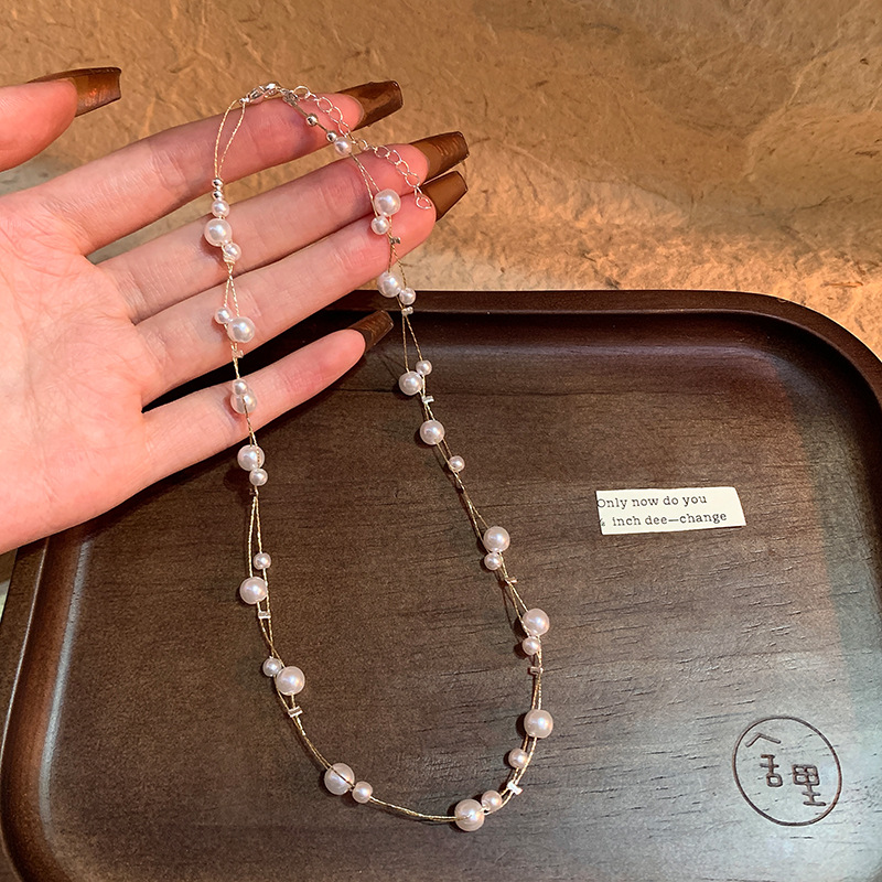Collier ras-de-cou coréen double rang en perles et étoiles pour femme, accessoire de luxe léger et raffiné._voghion.com