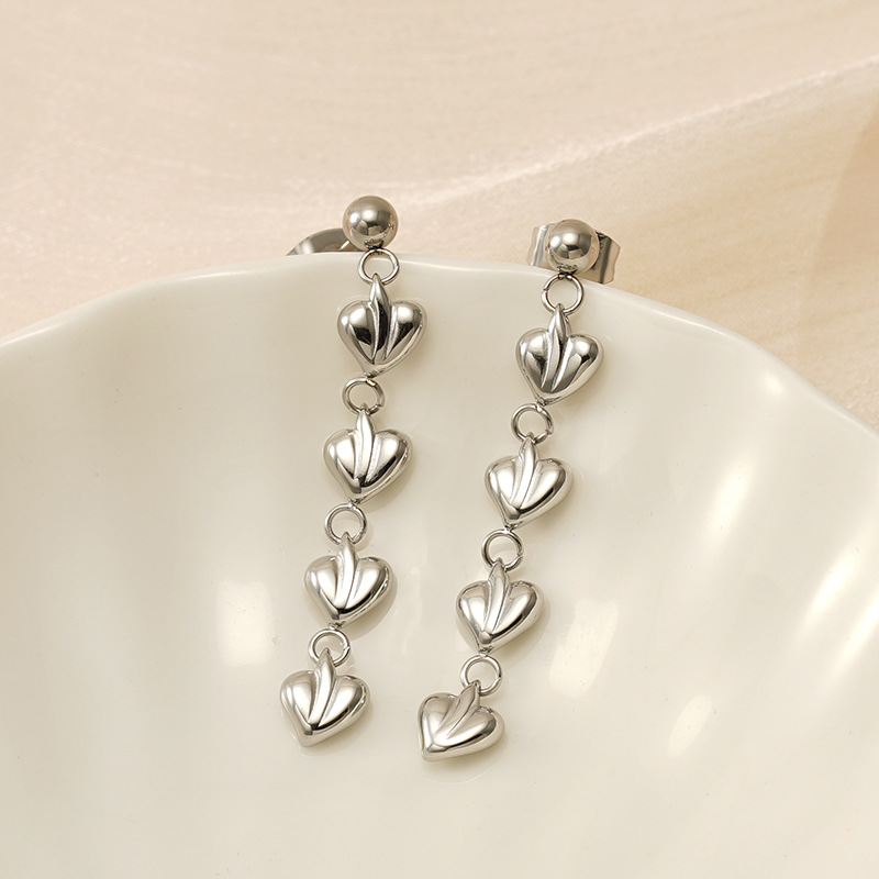 Pendientes de acero inoxidable de amor largo de nuevo estilo transfronterizo Pendientes de acero de titanio chapado en oro de dos colores de alta calidad para mujer