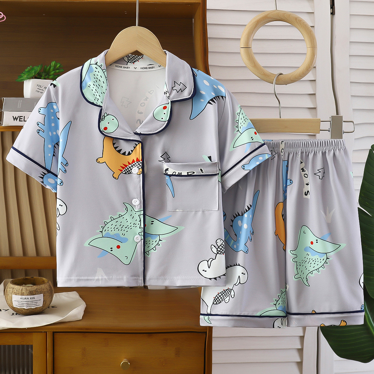 nns - pijama con solapa / dinosaurio gris
