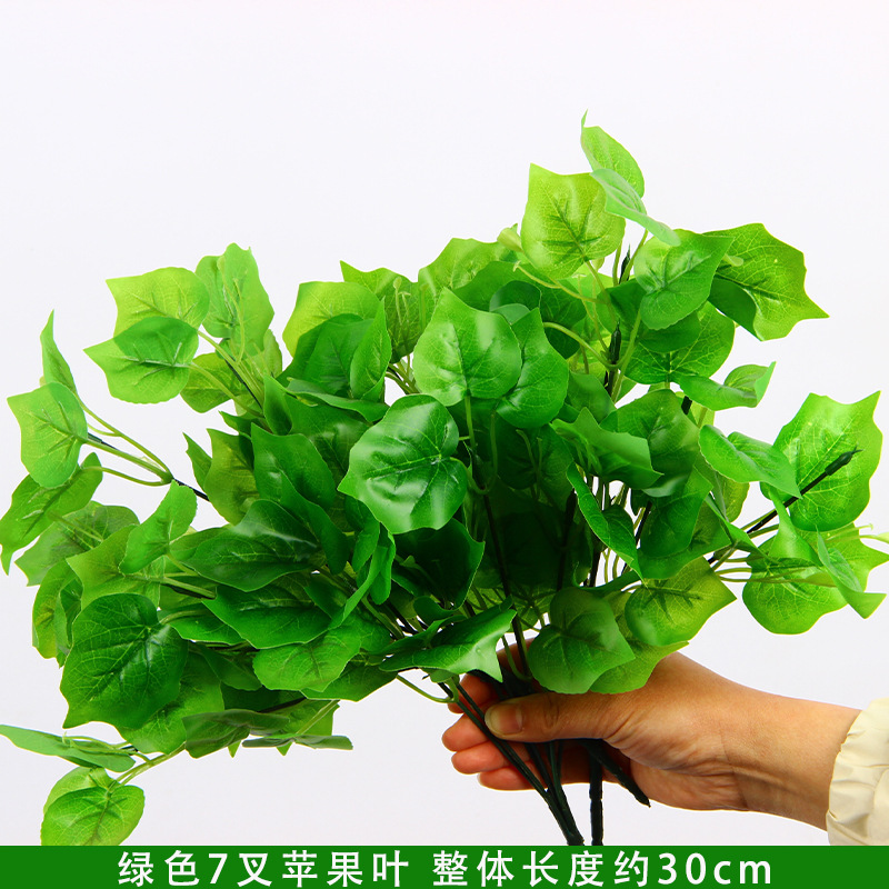 Simulación de flores verdes, flores de seda de boda, hierba