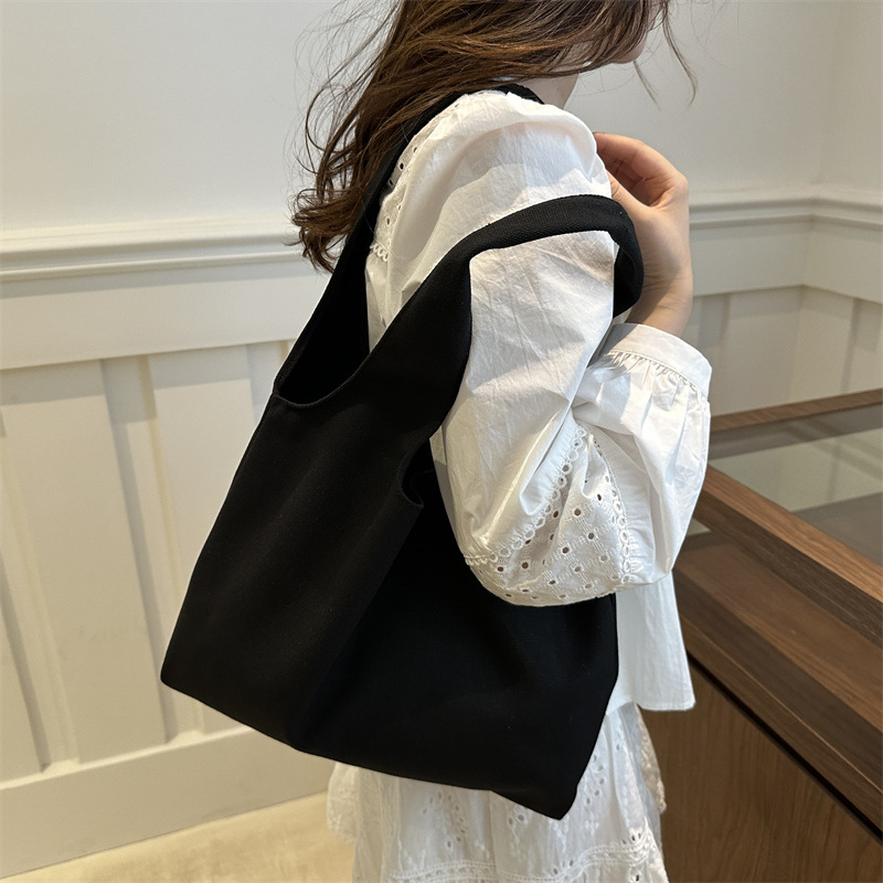 . Moda simple de gran capacidad de verano de color sólido nuevo estilo coreano de moda ocio de viaje bolso de hombro bolso de mujer