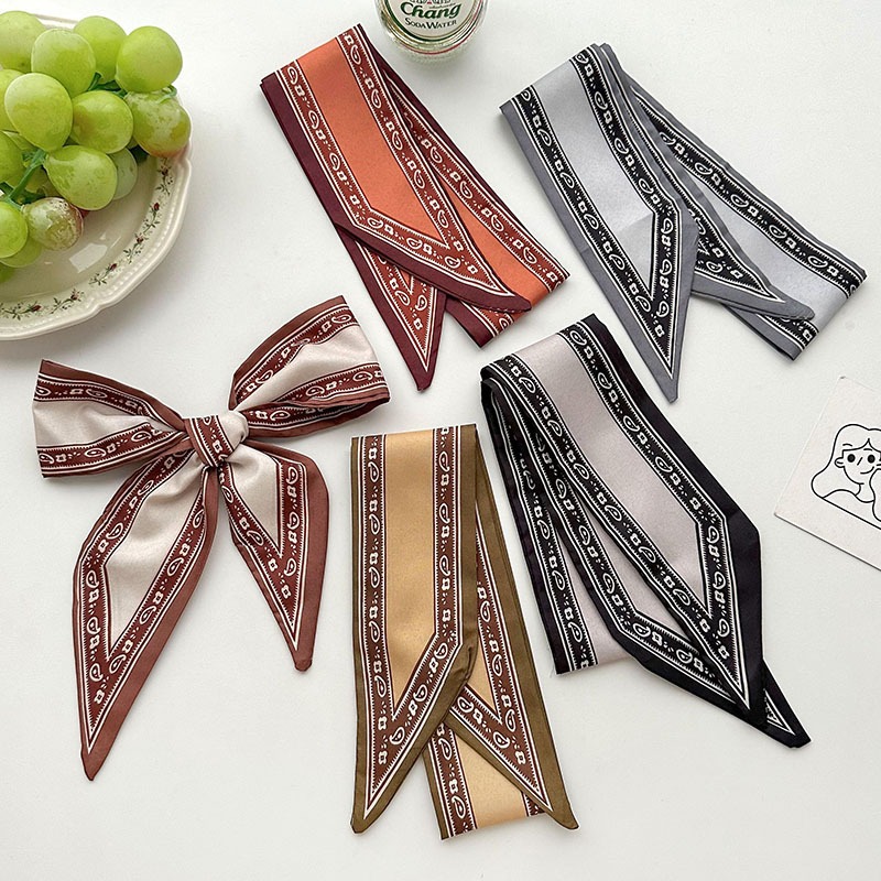 2025 mujeres primavera y verano coreano bolsas de cabello de color sólido correa de cabello de flores de caju