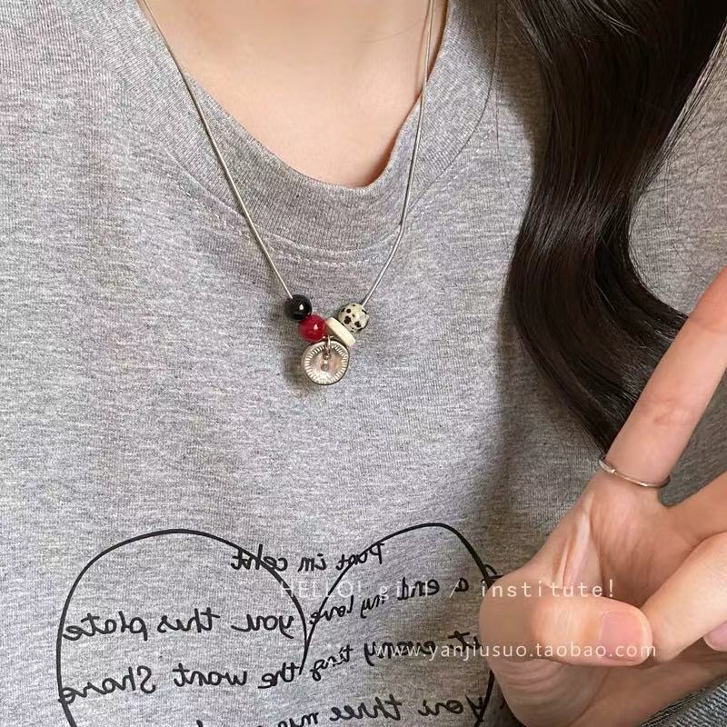 Distressed button necklace