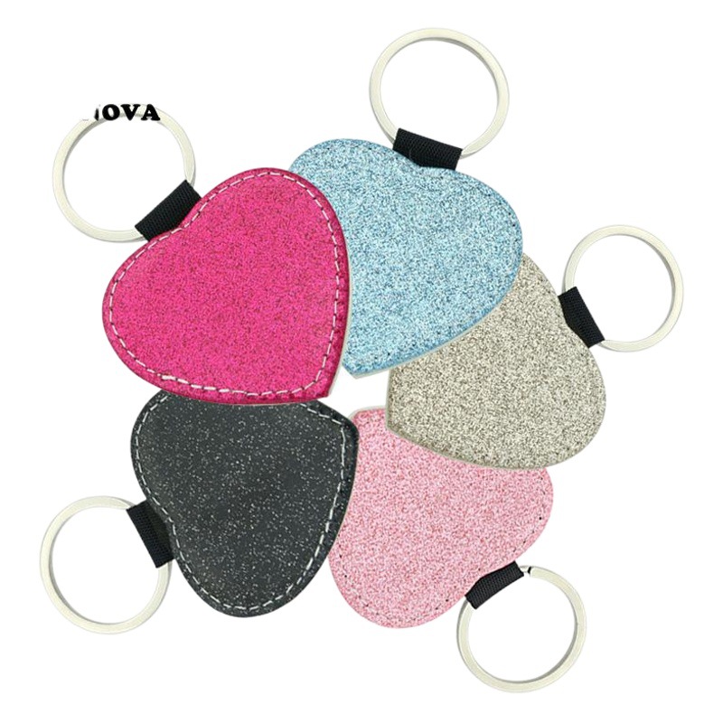 Transferencia térmica en blanco brillante llavero sublimación de un solo lado PU ornamento de cuero colgante llavero material