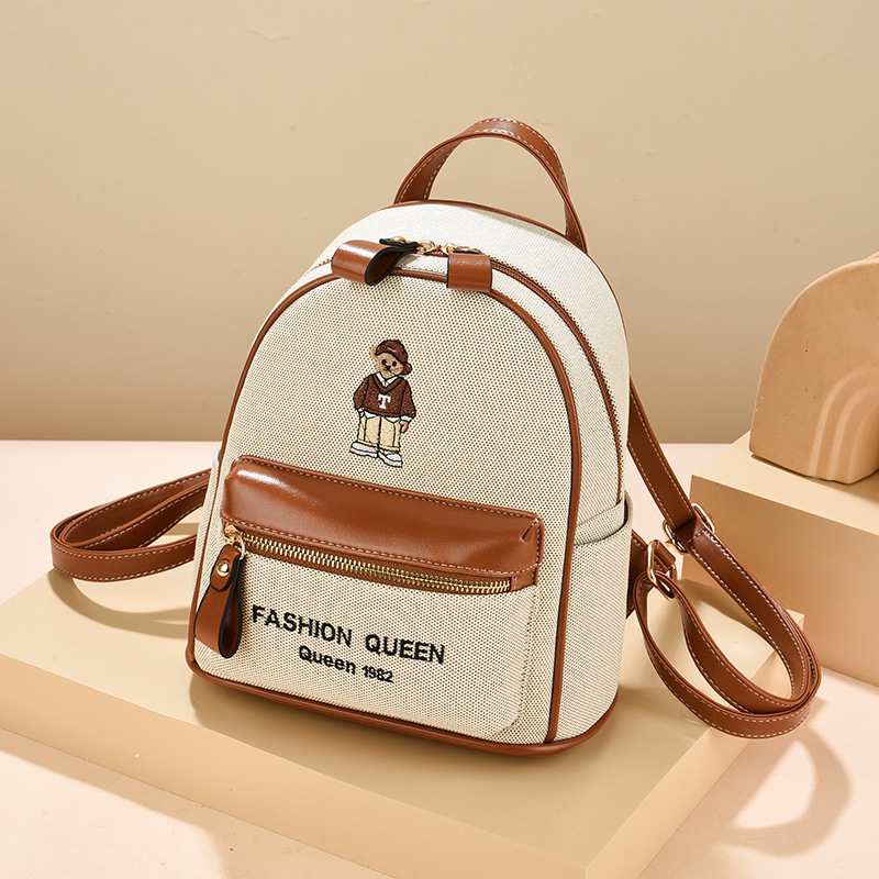 Mochila mujer 2025 nuevo estilo estudiante universitaria moda bordado mochila de viaje mochila de gran capacidad de doble uso