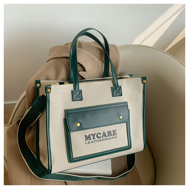 Bolso de lona de gran capacidad para mujeres 2024 nueva moda color contrastante empalme mochila de hombro simple bolsa de mano casual