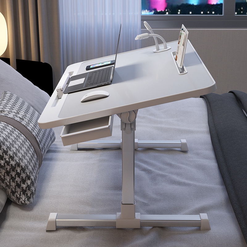 The small table of the computer desk on the bed can learn the bay…