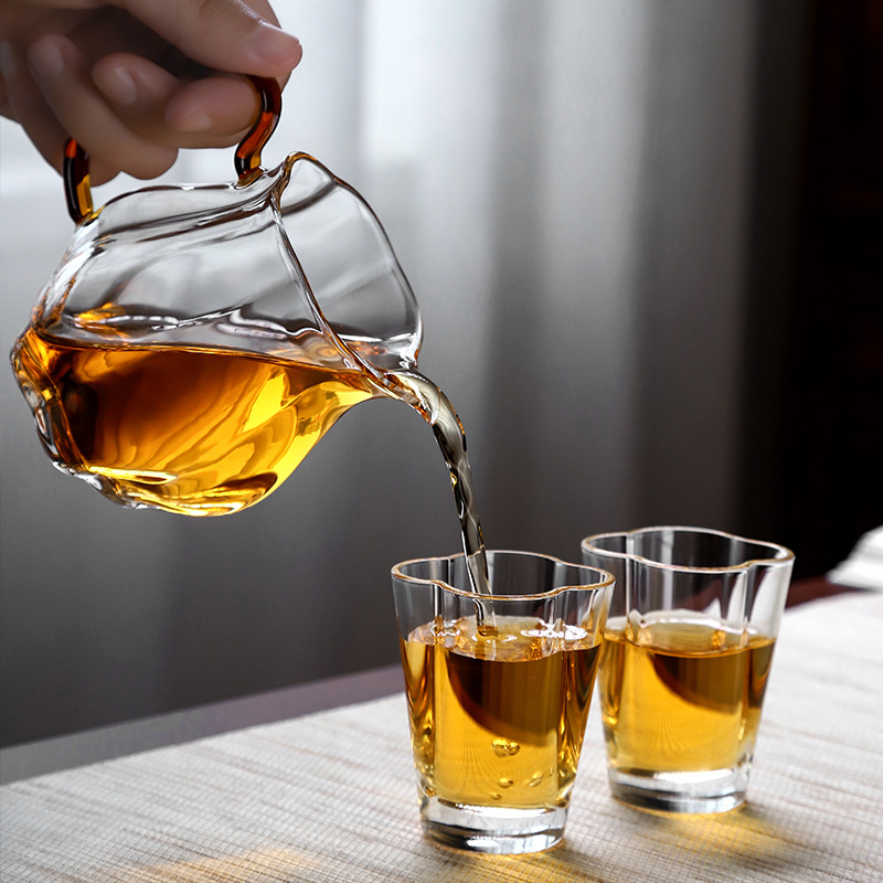 Supply wholesale petal tea cups with colored handles for offices with pointed tea dividers transparent heat-resistant glass fair cups