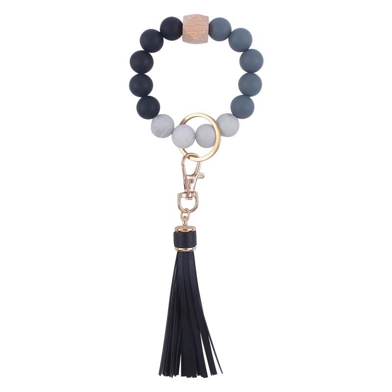 Creativo nuevo cuero pu borla colgante llavero silicona muñeca leopardo silicona pulsera llavero