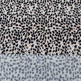 高弹乱麻 象牙白底黑香槟点涤纶弹力时尚乱麻