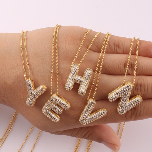 Hot-selling gold-plated copper bracelet with zirconia balloon bubble pendant, featuring 26 English letters.