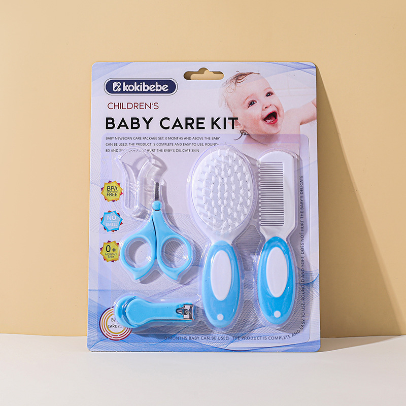 Envases en inglés transfronterizo Juego de cuidado de cepillo de peine de lana para bebés Tijeras de seguridad para bebés Herramienta de limpieza de cortaúñas