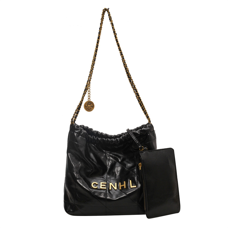 Bolsas de basura transfronterizas pequeñas bolsas de cubo de cadena de viento fragante para mujeres otoño y invierno 2025 nueva textura mochila de hombro de moda mochila