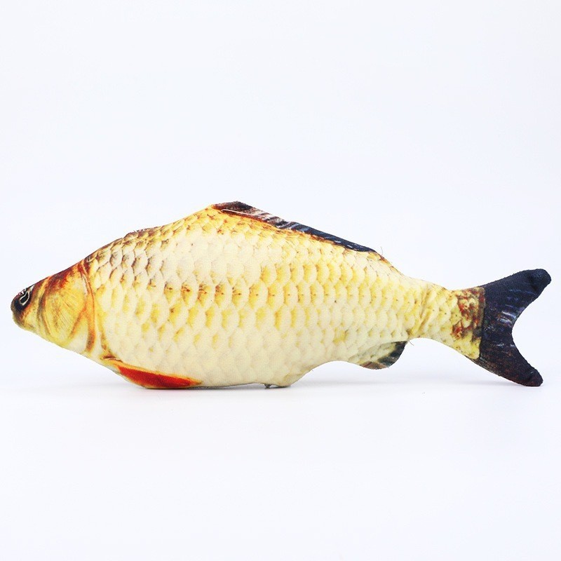 猫のおもちゃは猫の麻布の魚をからかいます。|undefined