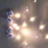 5cm lamp is 0.2 meters away from 4 lamp warm white (bulk) (three crown batteries LR44)