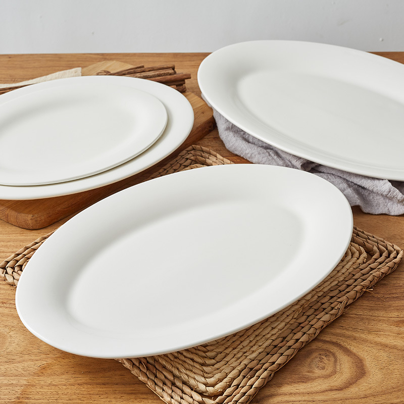 Plato de pescado de cerámica blanca pura Plato de pescado de porcelana reforzada ovalada gruesa Plato de pescado de autoservicio de vajilla de hotel de uso diario