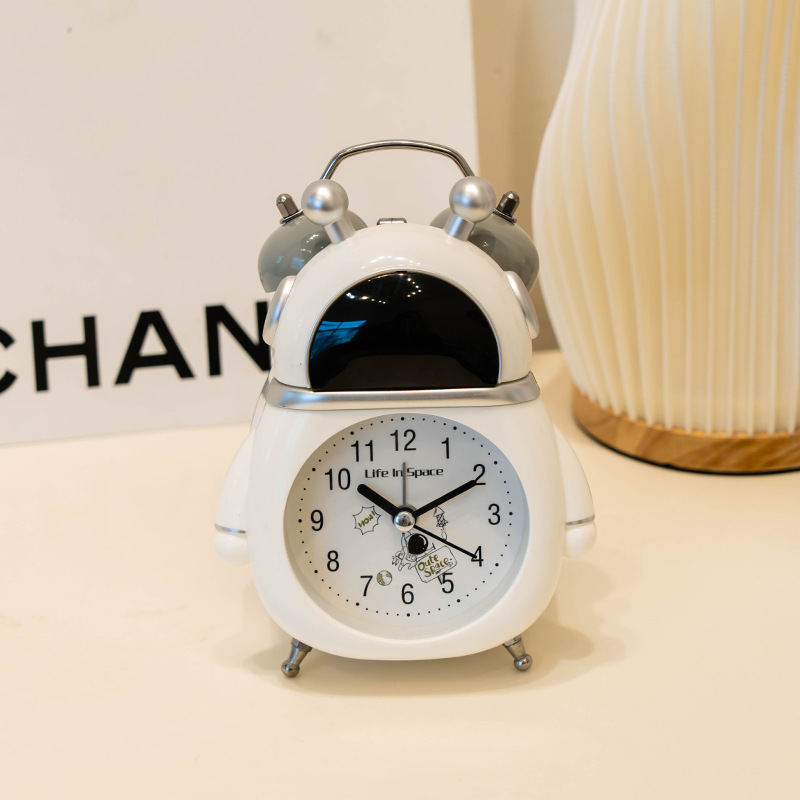 Venta directa de fábrica astronauta pequeño reloj de alarma niños reloj despertador estudiante especial despertador artefacto dibujos animados reloj de alarma de escritorio