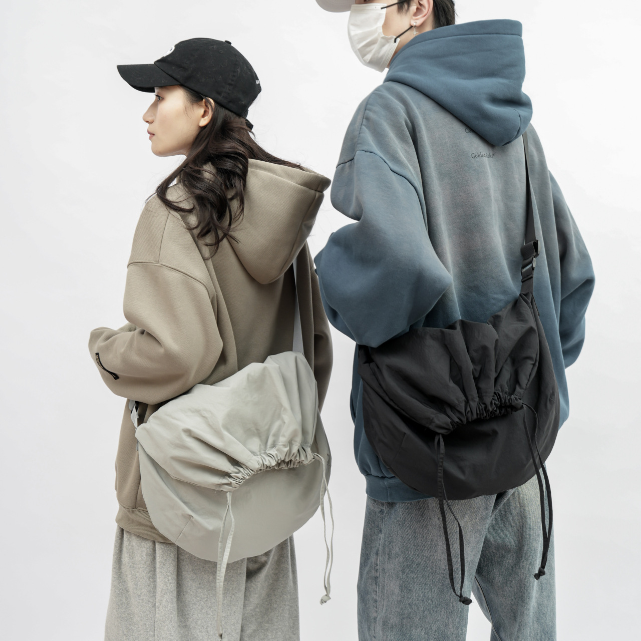 Bolso de cuerda simple nuevo bolso de hombro de color sólido para mujeres versión coreana de bolso retro tote para estudiantes universitarios con bolsos correccionales para hombres de moda