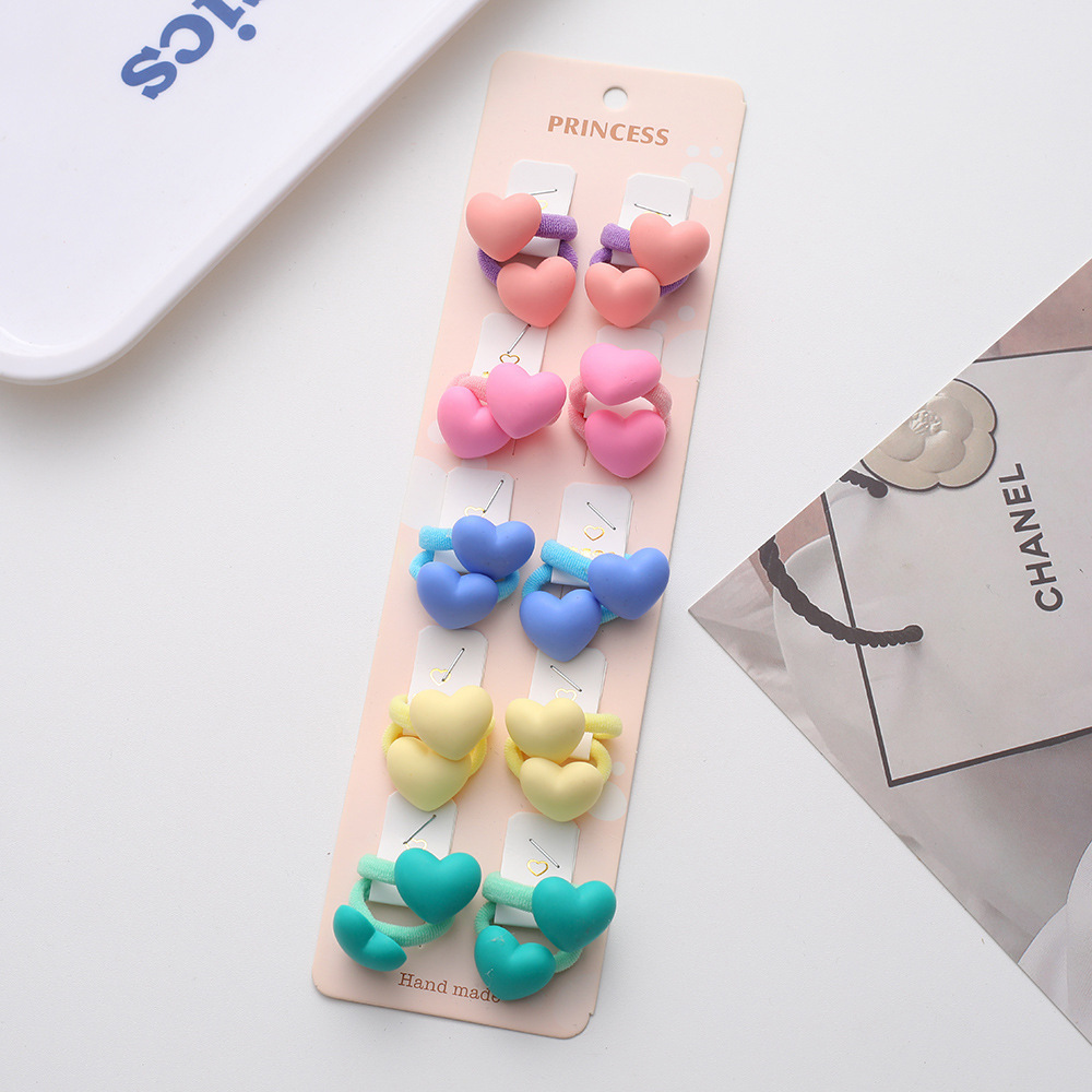 La alta elasticidad de los niños no duele la banda de goma de la cuerda del pelo del bebé de la banda linda del pelo del pulgar de la niña