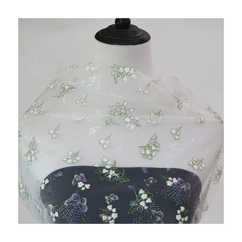 Fabricantes de venta a bajo precio para suministrar poliuretano impresa de malla mariposa colorido estampado fantasma nueva tela china estilo nacional