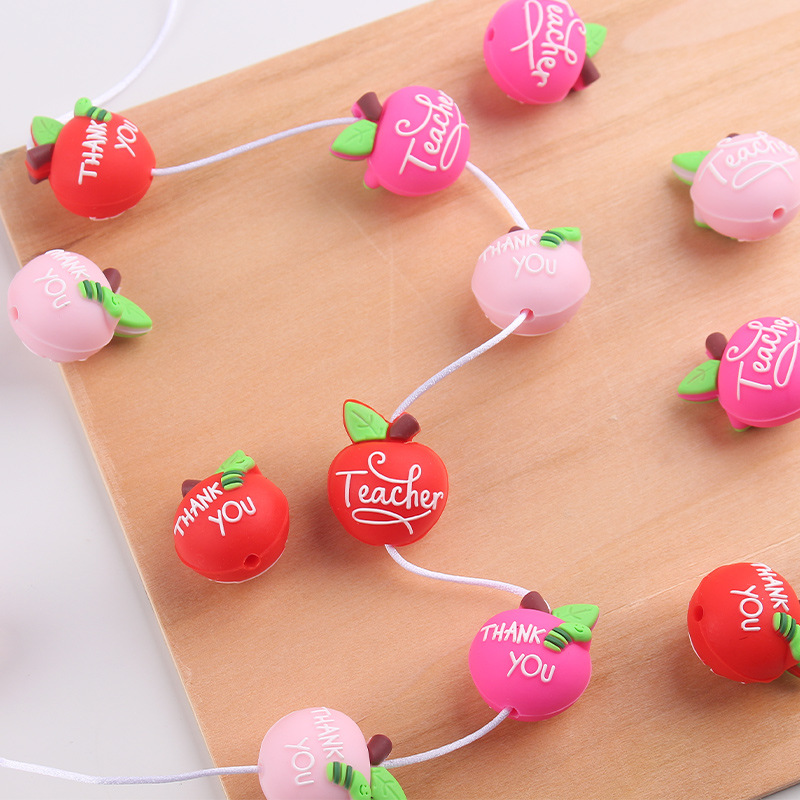 Productos creativos para bebés DIY dibujos animados de doble cara manzana joyas de silicona pezón de bebé anti-caída cadena accesorios de goma de diente