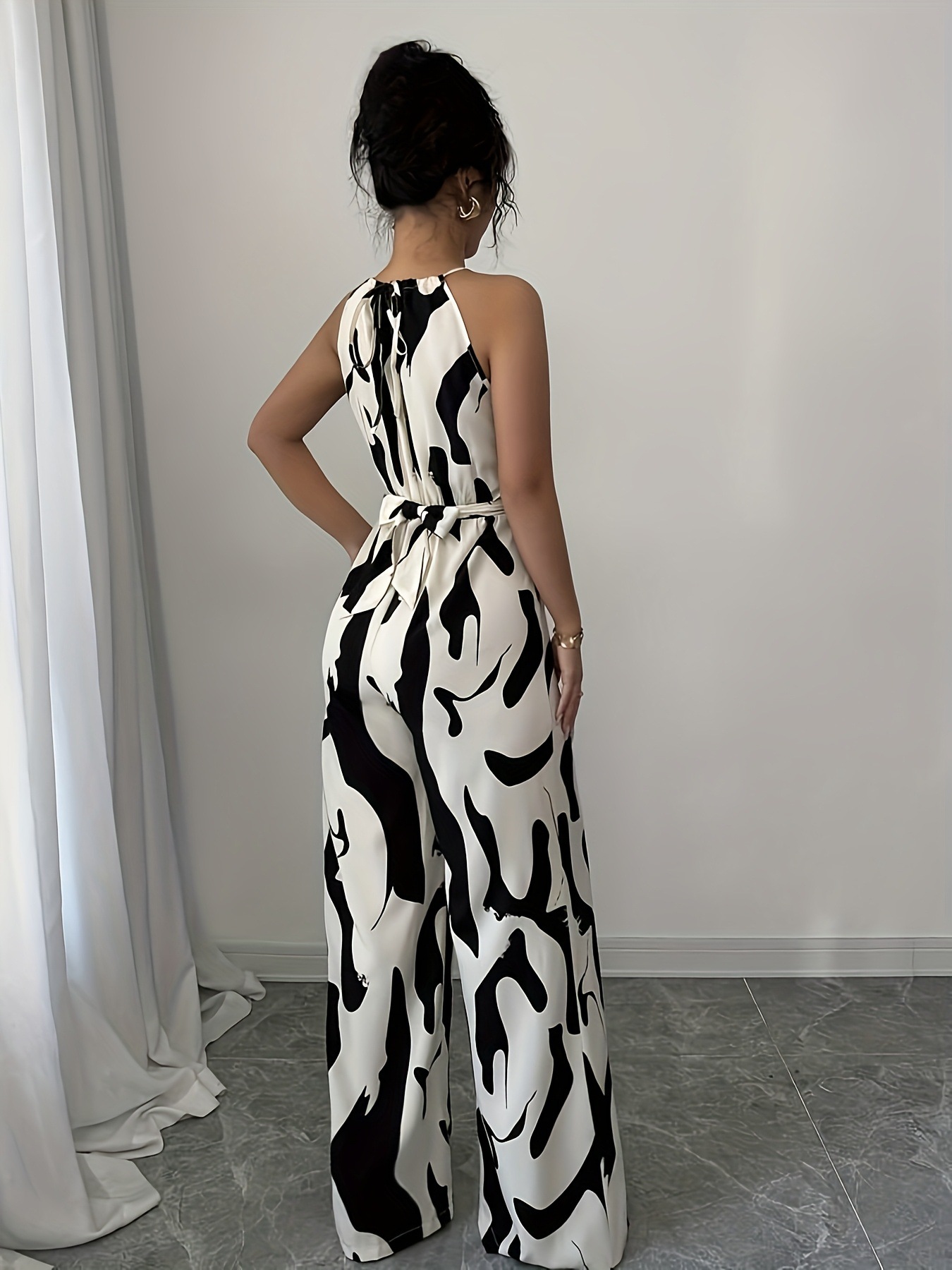 Damen Jumpsuit Mit Milch Muster Druck Halfter Ausschnitt Schwarz_voghion.com