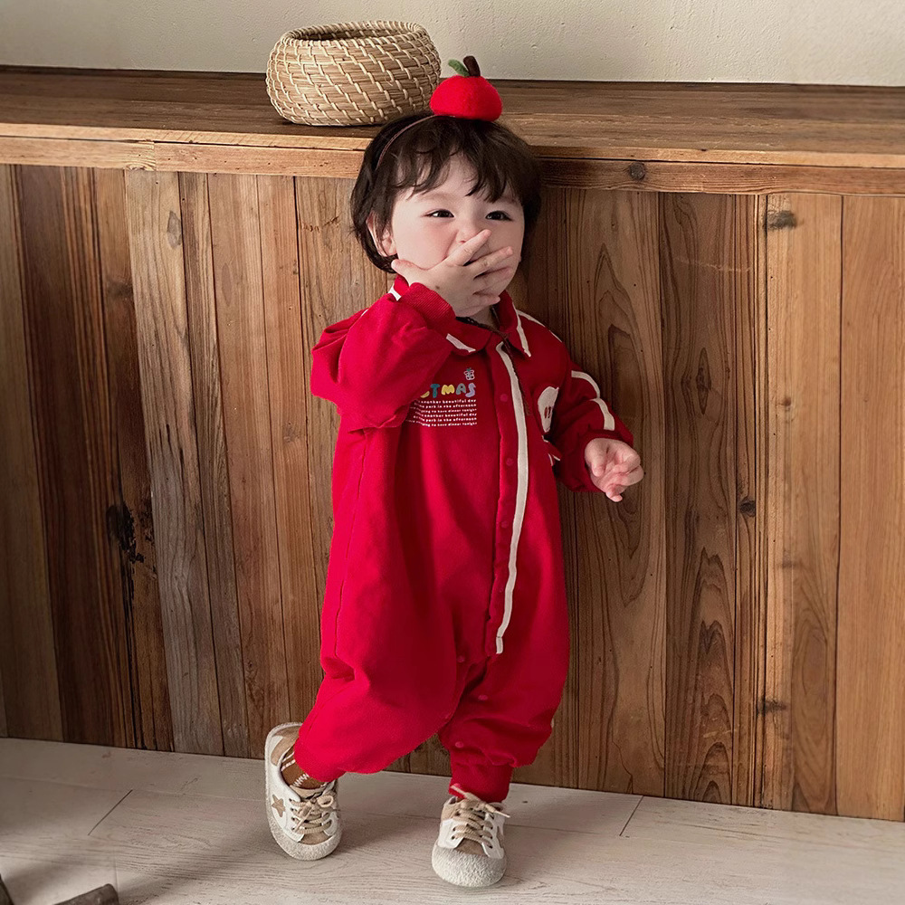 2024 nuevo producto bebé bebé coreano hombre bebé mono dibujos animados cara sonriente manzana mameluco rojo traje de año nuevo