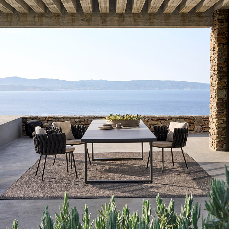Mesa y silla de cordón al aire libre patio jardín balcón al aire libre mesa de comedor de hotel simple villa combinación silla de caña