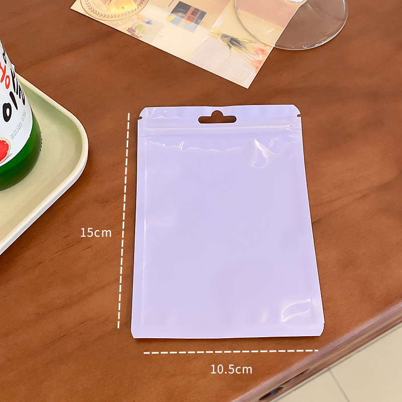 Macaron color bolsa de autosellado bolsa de plástico engrosada transparente color hueso bolsa de almacenamiento sellado bolsillo maquillaje cepillo bolsa de embalaje