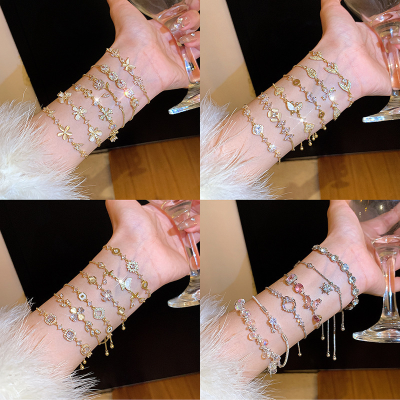 Korean Style Super Shiny Light Luxury Copper Inlaid Zircon Bracelet for Women, High-End Butterfly Versatile Cat's Eye Bracelet, Niche Jewelry Korean Style Super Shiny Light Luxury Copper Inlaid Zircon Bracelet for Women, High-End Butterfly Versatile Cat's Eye Bracelet, Niche Jewelry