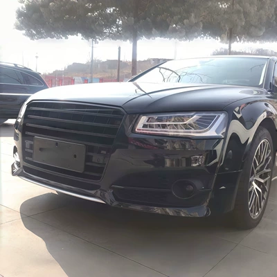 and a larger front grille, Big Surrounded