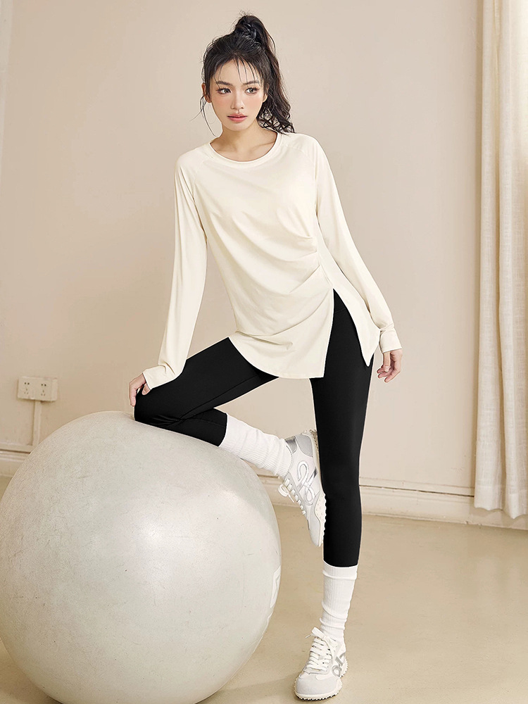 Plus-size yoga workout set for women, featuring a long-sleeved, high-waisted, tight-fitting jumpsuit with a slit, suitable for running and Pilates training