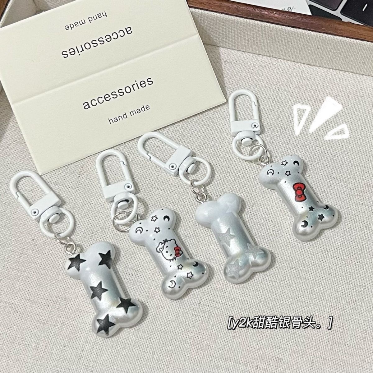 Ins gradient bạc xương nhỏ móc khóa ngọt ngào mát mẻ KT mặt dây chuyền mèo bestie quà tặng cặp đôi túi đi học phụ kiện sinh viên
