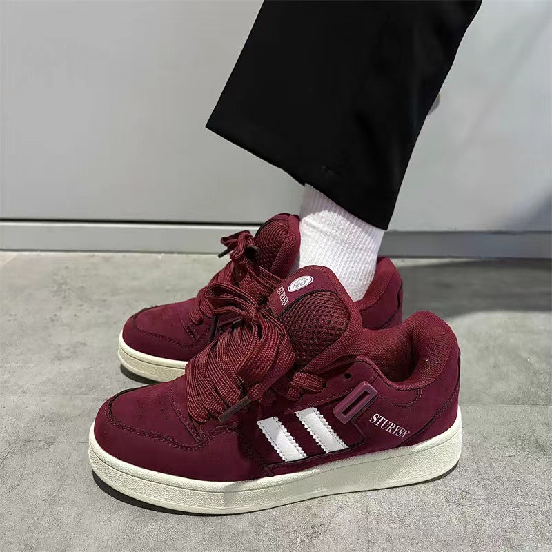 2025 nuevos estudiantes ociosos nichos hombres y mujeres parejas de skate de moda coreana in-street retro zapatos de skate de color para mujeres