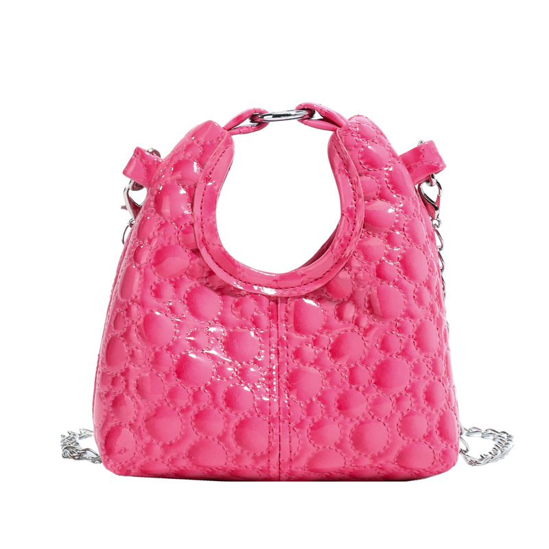 Paquete compacto mini bolso de hombro para niños y niñas coreanos simple bolso de bebé de color sólido 2026 nuevo bolso de cambio para niños