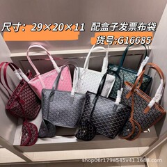 2025年の高品質の新型女性バッグの両面の小さいサイズの新型の本革の野菜のかごのショッピングバッグは手に持っています。