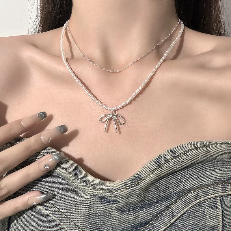 Серьга/П pendant from pearl with bow?