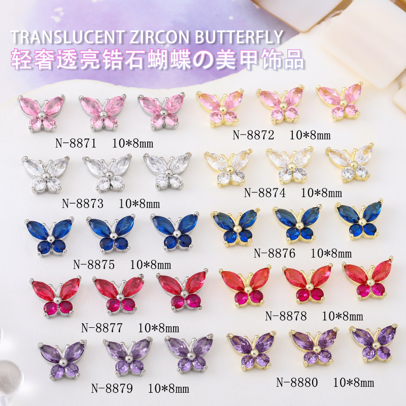 Lujo ligero súper centelleante mariposa de circón joyería de uñas metal súper hada pequeña mariposa manual uñas accesorios al por mayor