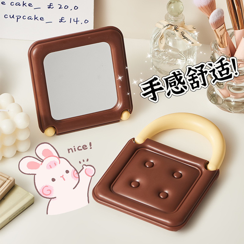 Espejo de bolso encantador, alto valor facial, espejo de maquillaje portátil pequeño, espejo de maquillaje de escritorio casero creativo de chocolate