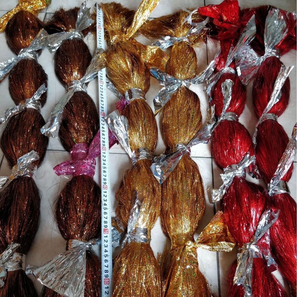 Hair Accessories in Coffee Brown with Scroll-Shaped Glitter Laser Strips, Champagne Gold Scattered Glitter Strips for Wigs, and Glitter Point Paper Box Lining