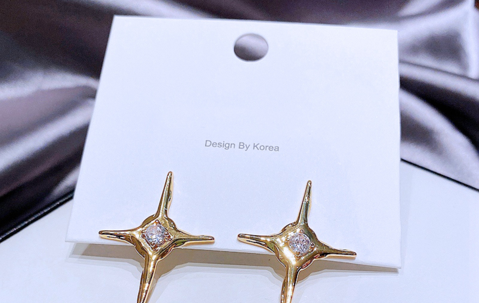 High-grade Ins Cold Cross Eight-pointed Stars Stud Earrings Female Copper Plating K Gold Fashion Zircon Earrings Cross-border Sold Jewelry display picture 1
