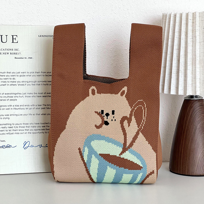 Bolsa de mano de damas nicho diseño de dibujos animados de punto chaleco de punto regalo de mano mochila de hombro al por mayor