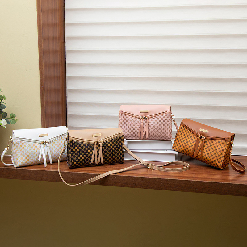 Bolsas de mujer transfronterizas al por mayor 2025 nuevas bolsas de damas nicho universal mochila bolsas de hombro impresas
