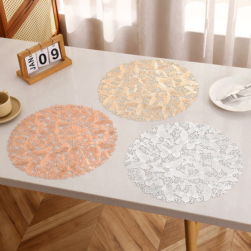 Diseño hueco de fábrica mariposa almohadilla impermeable a prueba de agua a prueba de aceite PVC almohadilla de taza de lujo ligera europea almohadilla de mesa INS almohadilla al por mayor