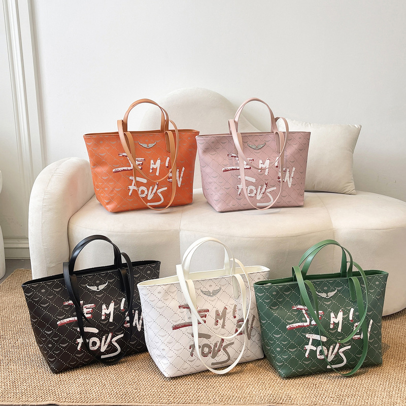 New Cross-Border Exclusive Zv Bag, Large Capacity, Fashionable Commuter Tote Bag with Embossed Wings and Rhinestone Accents New Cross-Border Exclusive Zv Bag, Large Capacity, Fashionable Commuter Tote Bag with Embossed Wings and Rhinestone Accents