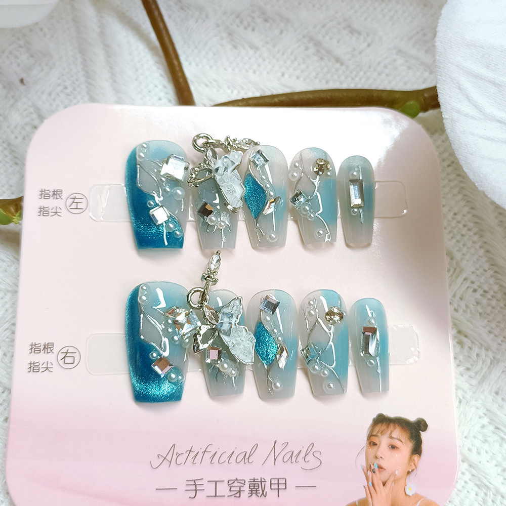 Manicura de Año Nuevo, 10 piezas de diamantes de perlas hechos a mano, arte de uñas portátil, parche de uñas Xiaohongshu, venta al por mayor