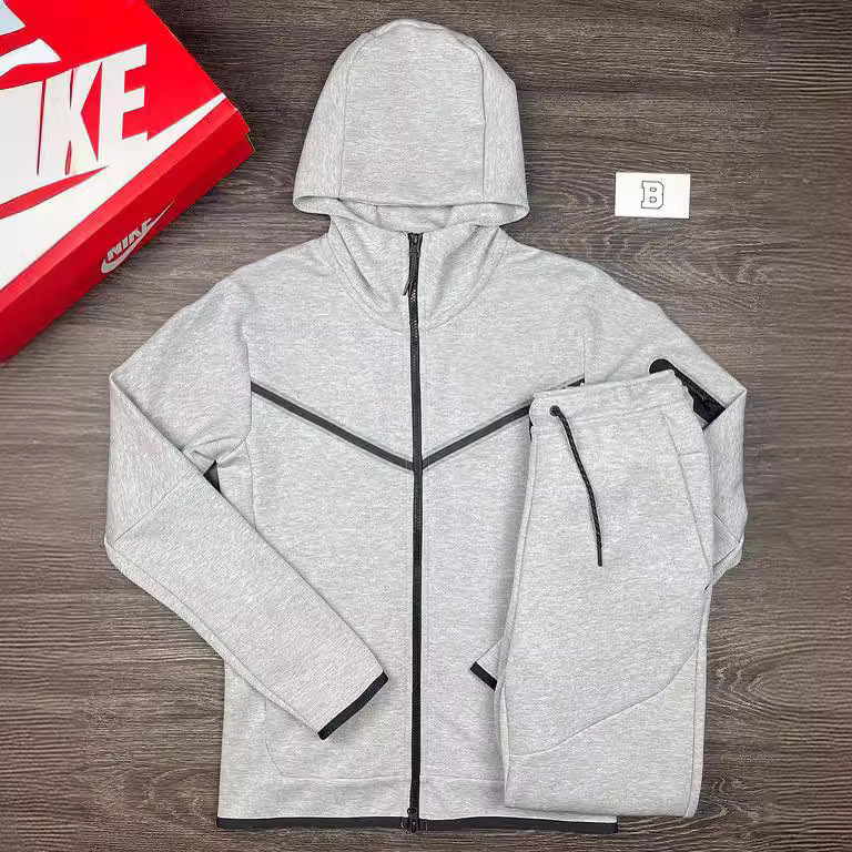 Trajes deportivos para hombres de venta caliente de Amazon transfronterizo en Europa y América Primavera y otoño nuevos pantalones de ropa deportiva con capucha Trajes casuales