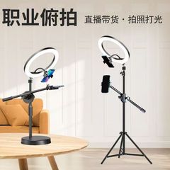 携帯電話の下げ撮りスタンドのデスクトップが着地して撮影します。