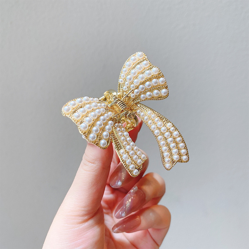 Pequeñas pinzas de cabello de perla temperamento feminino medio agarrado pinzas de cabello de borde pequeño adornamiento de cabeza de alto nivel no lastimar pinzas de cabello